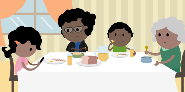 Familia en el comedor mientras la niña usa su celular inteligente